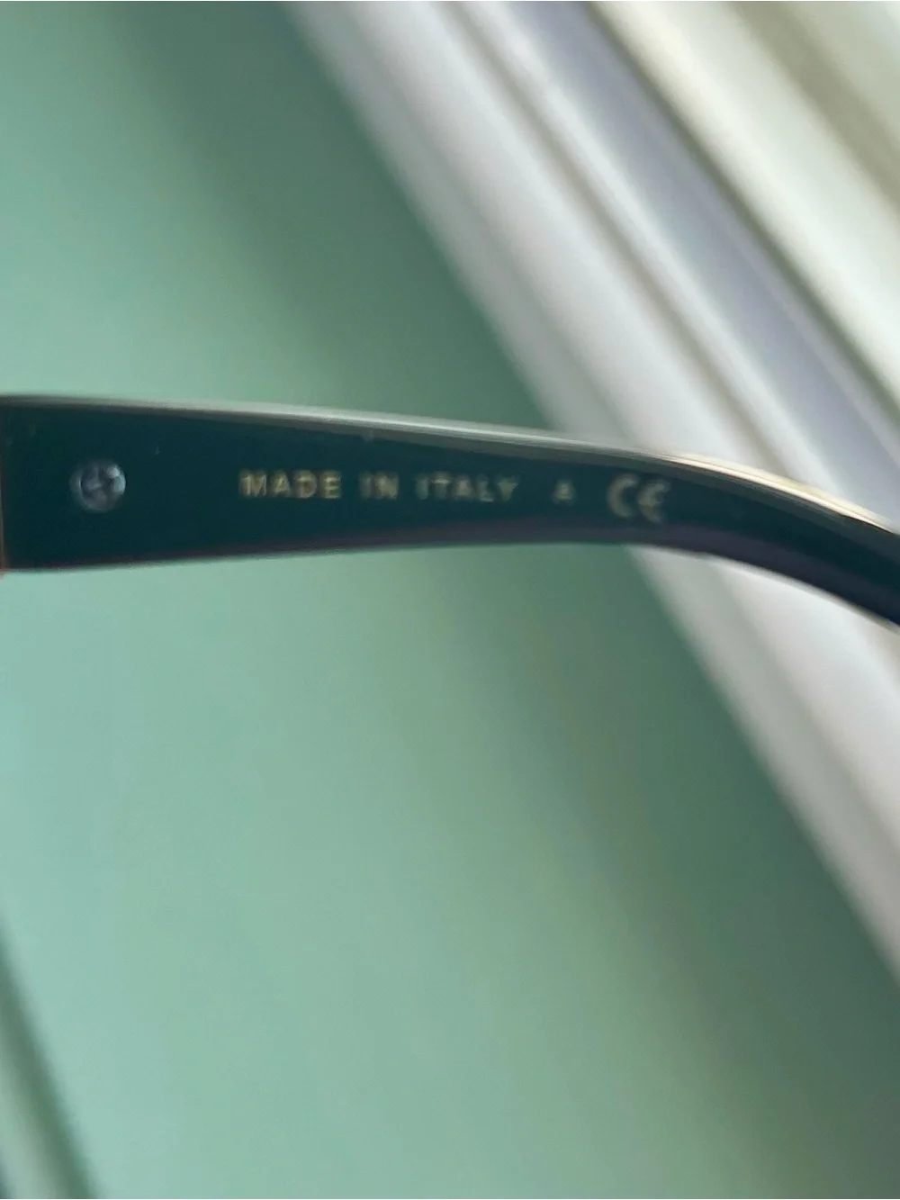 CHANEL Black Sunglasses with Gold Temples